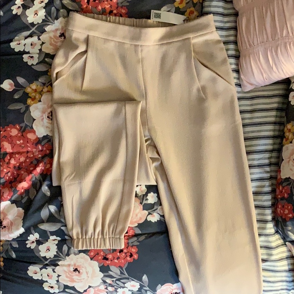 Dress pants with cinched ankles